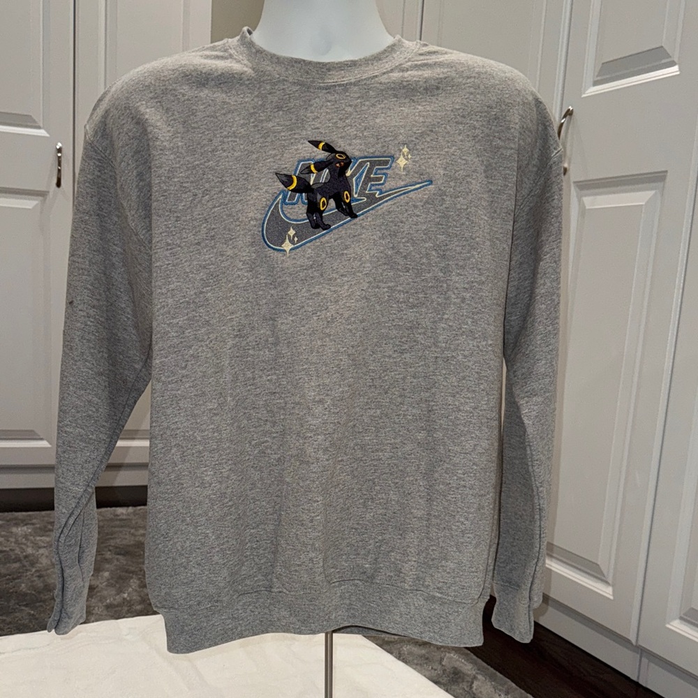 Nike Gray Crewneck Sweater with Graphic.